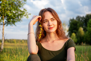 Portrait of a young woman in the park.