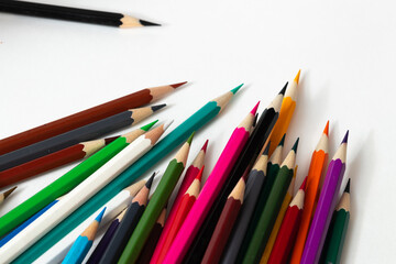 Many colorful pencils for children are brought together.