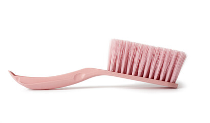 pink plastic brush for cleaning the house isolated on a white background