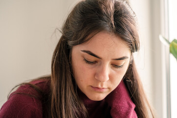 Fototapeta premium Close up of girl working on tablet from home during period of restrictions.