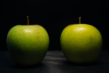 green apples on black
