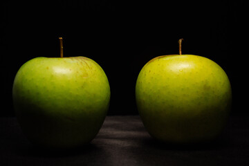 green apples on black