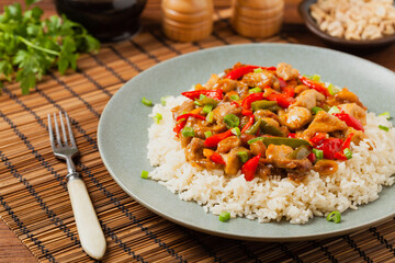 Chicken kung pao. Fried chicken pieces with peanuts and peppers.