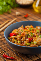 Chicken kung pao. Fried chicken pieces with peanuts and peppers.