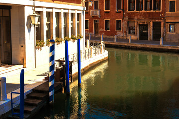 The streets-canals in venice at summer noon