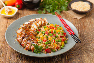 Grilled chicken breast in teriyaki sauce. Served with brown rice and vegetables.