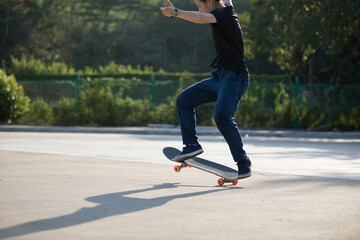 Skateboarder skateboarding at morning outdoors