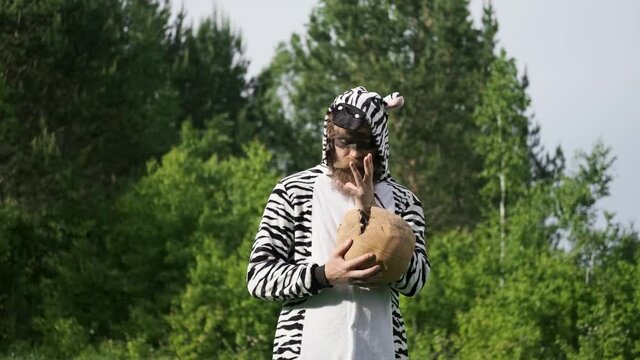 Crazy people, man in a Zebra costume, bright emotion,kigurumi, funny moment, facial expressions, antics, good mood
