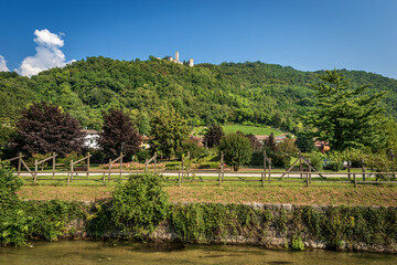 Fototapeta na wymiar Borgo Valsugana, small village in Sugana valley, with the river Brenta and the Castel Telvana, Medieval castle XIII century. Trentino Alto Adige, Italy, Europe