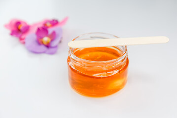 Bowl with sugaring paste or wax honey for hair removing. Depilation