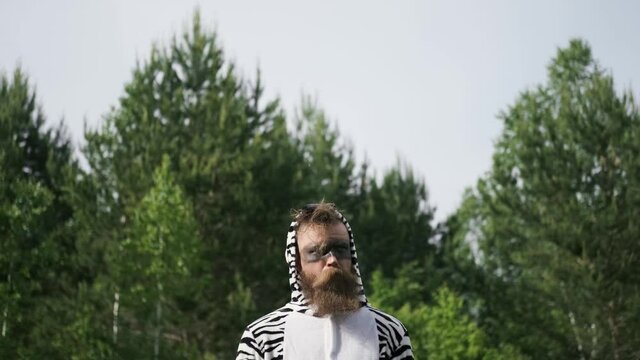 Crazy people, man in a Zebra costume, bright emotion,kigurumi, funny moment, facial expressions, antics, good mood