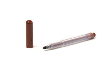 Brown marker pen on isolated background with clipping path. Vivid highlighter and blank space for your design or montage.