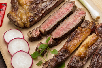 Grilled beef steak, cut into pieces. Close up