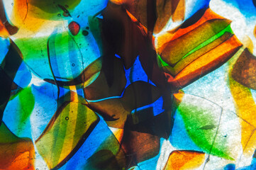 An abstract image consisting of correct and incorrect geometric shapes. Multi-colored tones.