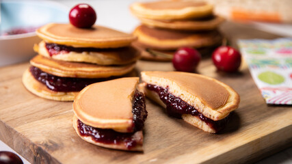 Japanese dorayakis with cherry sauce