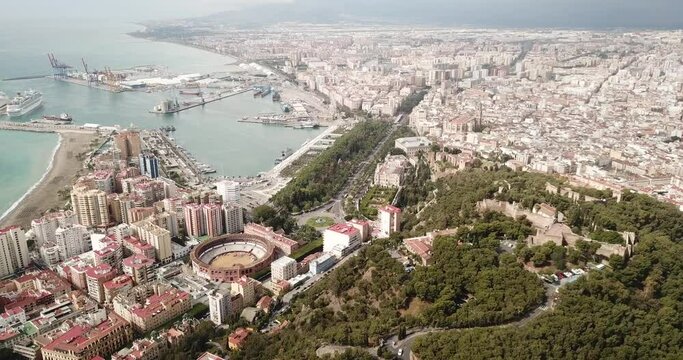 Malaga with Placa de Torros from castle in sunny time. Andalusia, Spain 