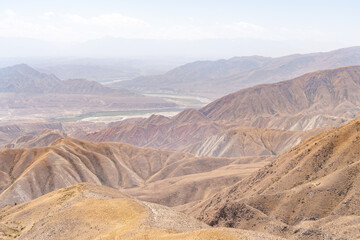 The amazing wild view of kyrgyzstan landscape full of snow peaks and wilderness