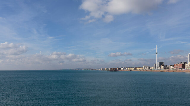 The Brighton seafront and the British Airways i360 from Brighton Palace Pier, Brighton, England