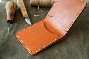 Leather wallets and leather instruments