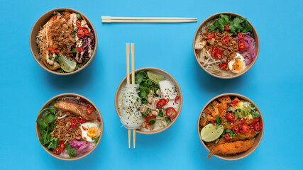 Five Asian Cuisine with Chopsticks on Blue Background