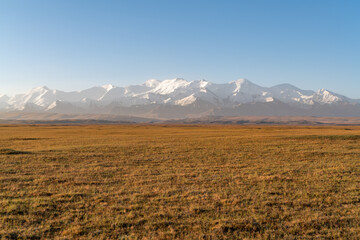 Obraz premium The amazing wild view of kyrgyzstan landscape full of snow peaks and wilderness