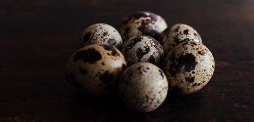 quail egg close-up on a wooden background