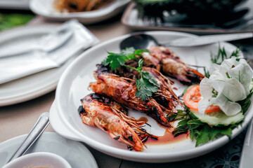 Fried shrimps with herbs, close up view in Khao Rang Phuket.