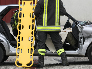 yellow stretcher and the firefighter