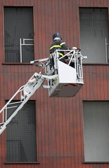 firefighter on the aerial platform