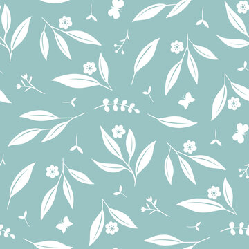 Pretty blue seamless pattern with leaves, flowers and butterflies