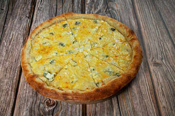 Cheese pizza Margarita with a thick cake with five varieties of cheese