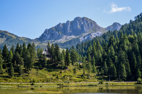 Panoramic view of the Julian Alps in summer, seen from passo Pramollo on the border between Italy and Austria. Mountain Landscape.