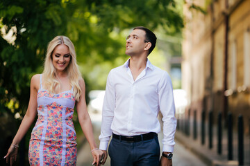Naklejka premium Loving couple walking in the city. Lviv