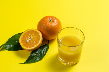orange juice and sliced ​​orange. a glass of orange juice,
