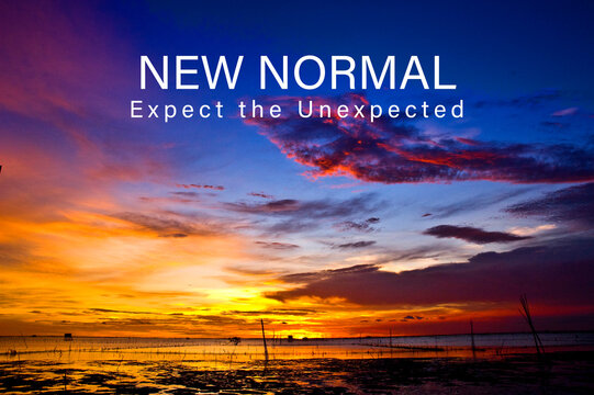 New Nomal Expect The Unexpected, Wording Over The Exiting Clouds In The Evening.  Creatve Concept Of The New Normal Life Style After The Outbreak Of The Corona Virus.