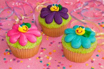 Cupcakes baked with frosting and confetti sprinkles with gluten free ingredients