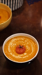 Pumpkin cream soup and littel tomato