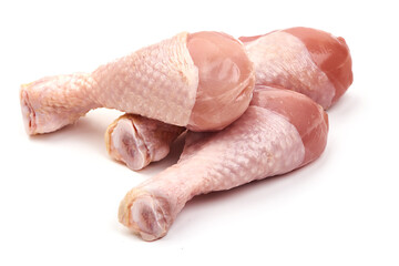 Raw chicken drumsticks, isolated on white background