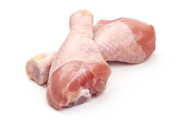 Raw chicken drumsticks, isolated on white background