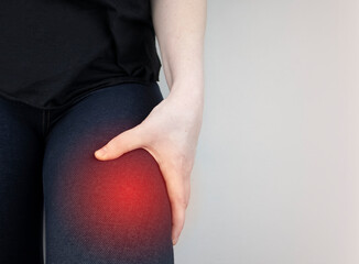 A woman suffers from hip pain. The concept of treating a hip joint for trauma, plantation or...