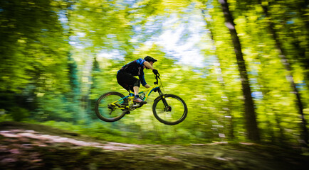 jumping mountain biker