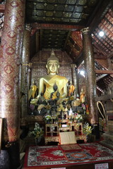 Fototapeta premium Bouddha du Vat Xieng Thong à Luang Prabang, Laos