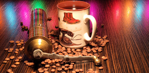 Coffee cup on roasted coffee beans.