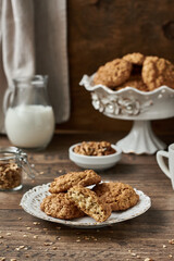 Breakfast with healthy oatmeal cookies, coffee and milk	