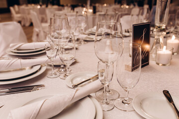 Banquet table setting and decoration. Cutlery on the table.