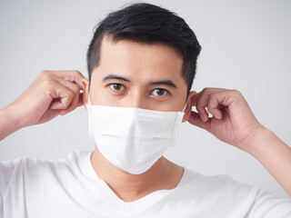 Young man in protective medical mask.