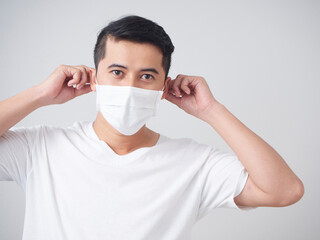 Young man in protective medical mask.