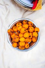 Ripe tropical loquat fruit on plate