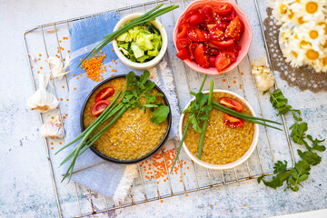 Vegan healthy balanced food on lunch. Cooked lentil, vegetables salads.