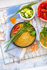 Red Indian lentil cooked vegetarian food. Vegan lunch or dinner